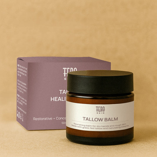 Tallow balm jar with black lid and brown container on a beige background